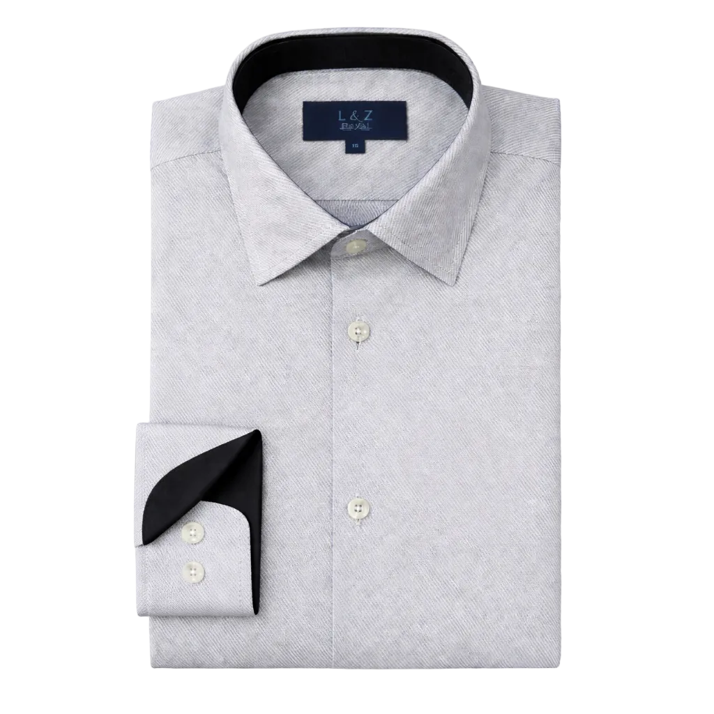 Folded gray dress shirt with black cuff and collar on a white background