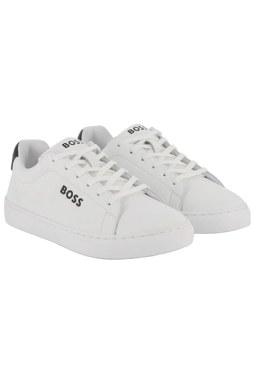 White sneakers with 'BOSS' branding on a white background