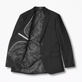Black blazer with patterned lining on a white background